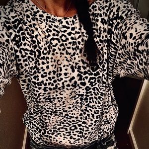- Women’s leopard print 3/4 sleeve top